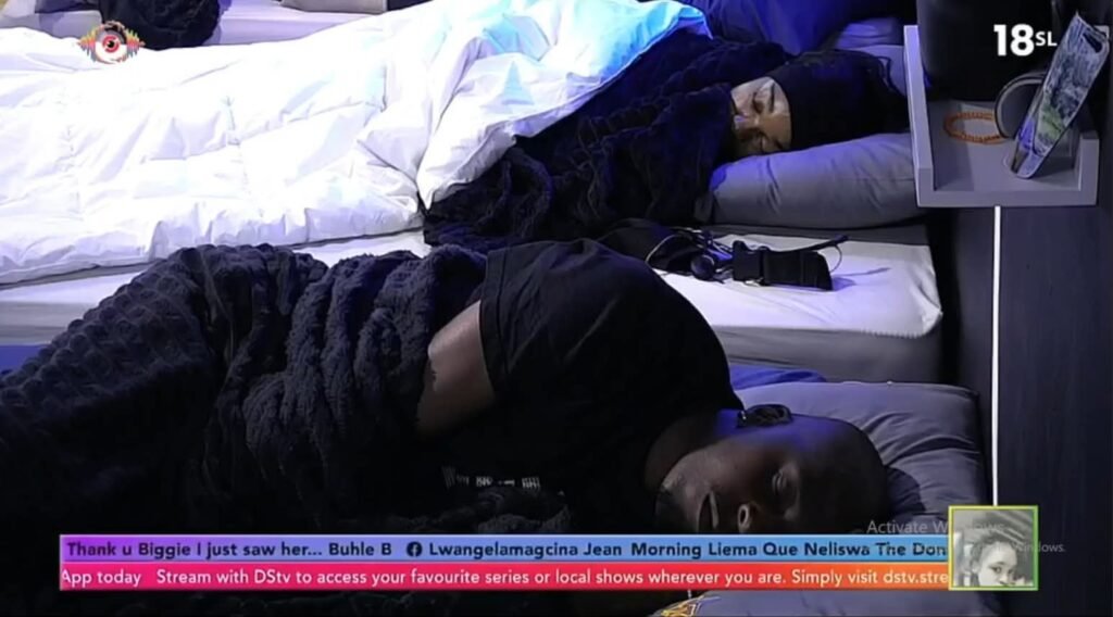 Mmeli and Thandeka sleeping in separate beds