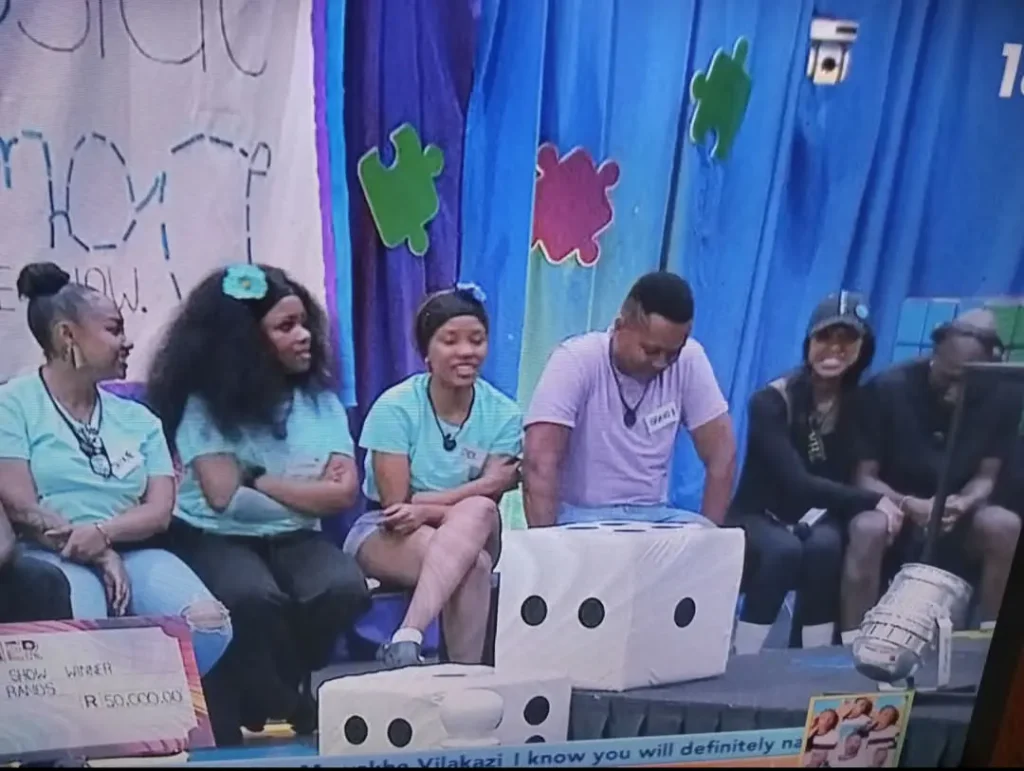 Housemates during week 9 wager task presentation 
